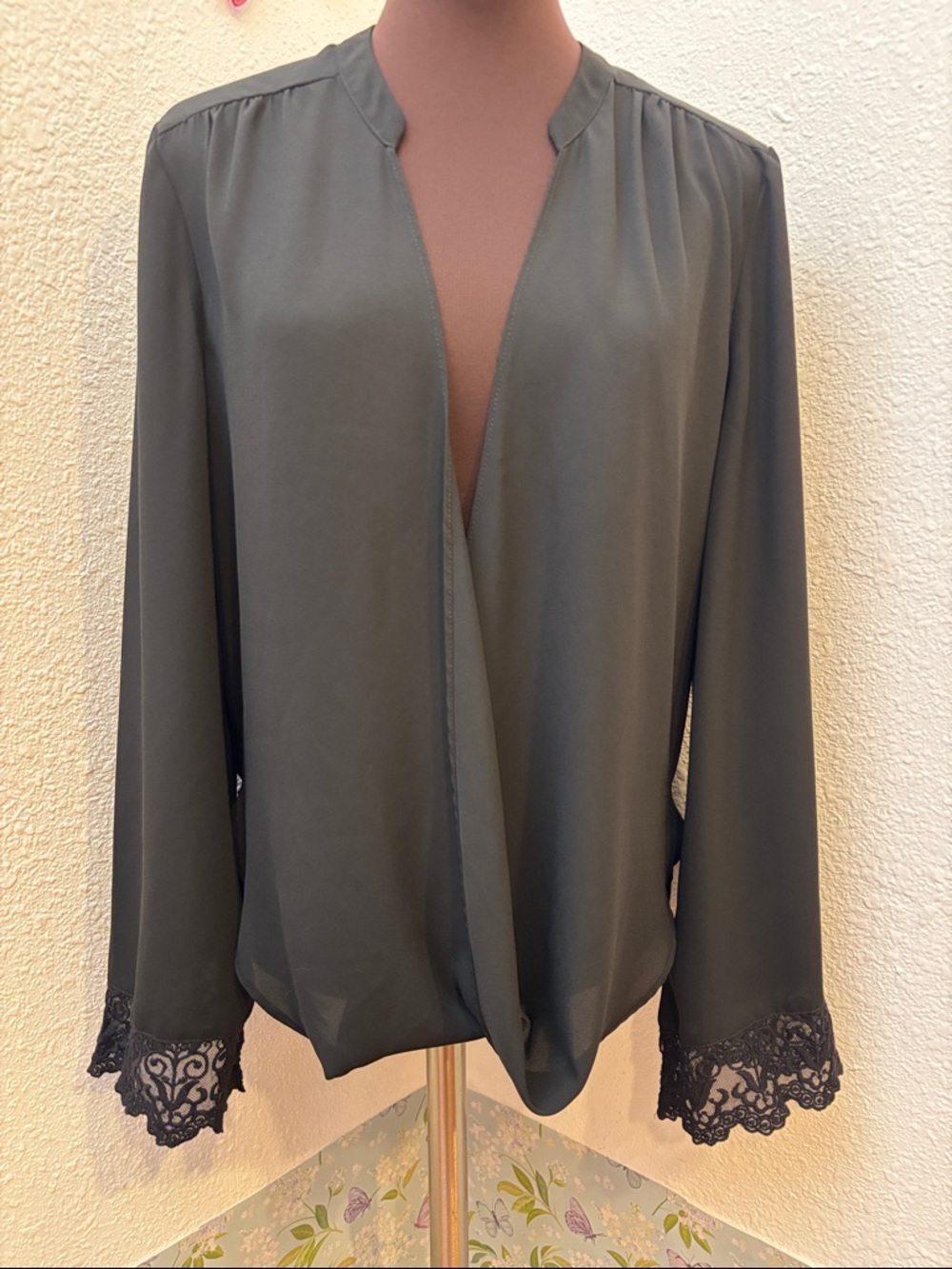 Vintage Y2K Jealous Tomato black draped blouse with floral lace cuffs. Size M.
